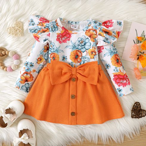 2pcs Baby Girl Allover Floral Print Ruffle Long-sleeve Ribbed Top and Solid Waffle Bow Front Skirt Set