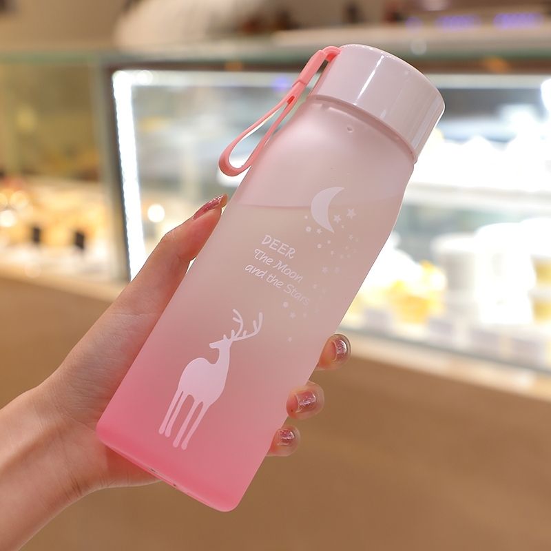 Fantasy elk gradient color frosted space cup with rope outdoor portable water cup cute plastic water bottle with drop resistance (The printing pattern is random) Light Pink