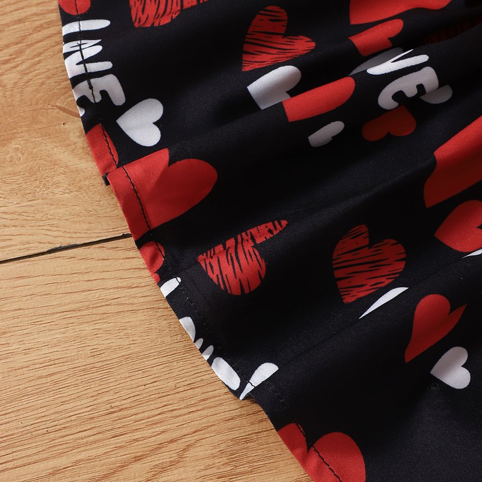 3pcs Baby Girl Allover Heart & Letter Print Ruffle Trim Suspender Skirt and Solid Short-sleeve Romper with Headband Set Black big image 6