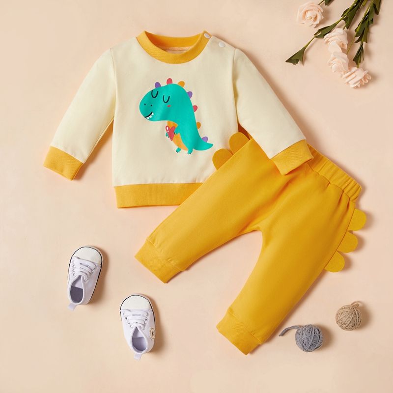 2pcs Dinosaur Print Splice Pullover and Solid 3D Serration Decor Yellow Pants Baby Set Yellow