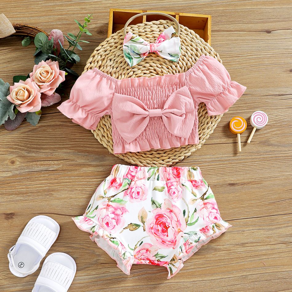 3pcs Baby Girl Pink Off Shoulder Puff-sleeve Bowknot Shirred Crop Top and Floral Print Shorts with Headband Set Light Pink