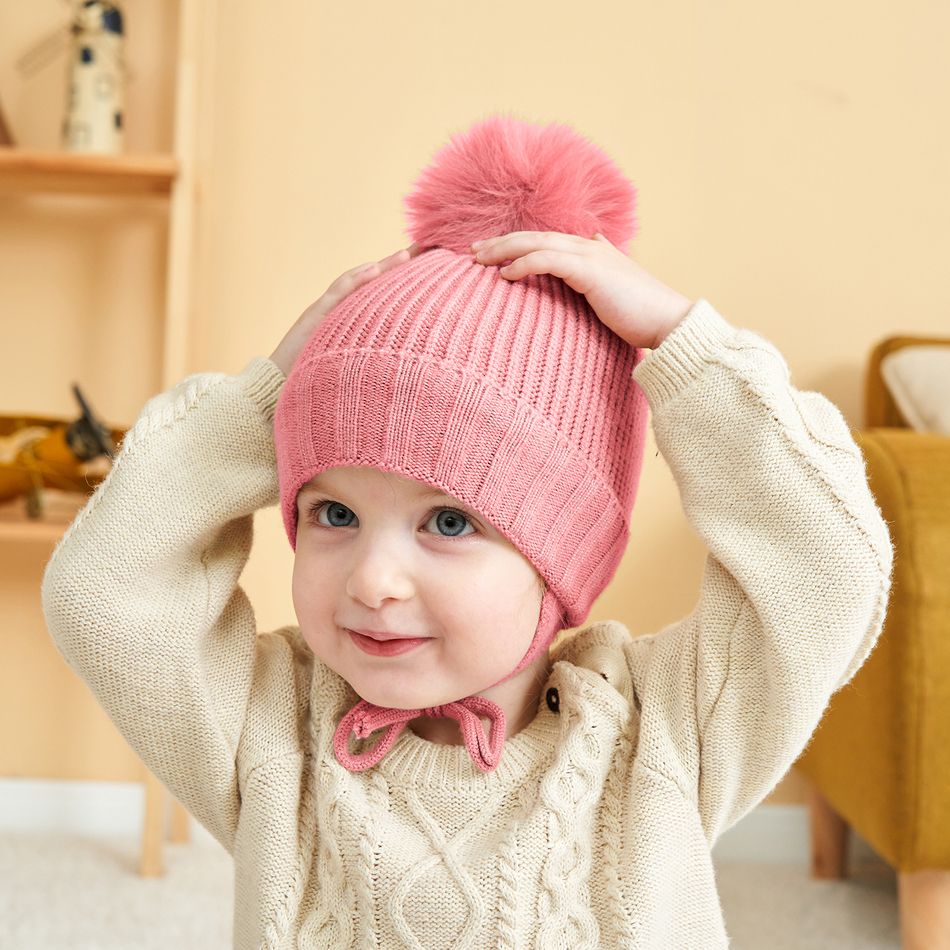 Baby-/Kleinkind-Mütze mit Ohrenschutz aus geripptem Strick zum Schnüren rosa