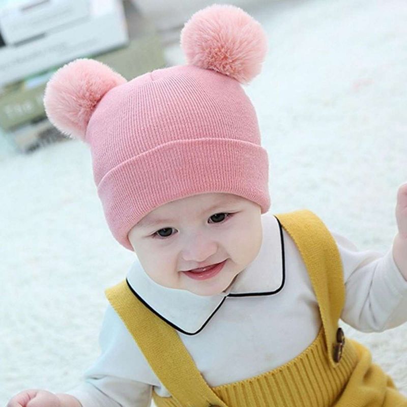Gestrickte Beanie-Mütze mit Bommel für Babys/Kleinkinder rosa