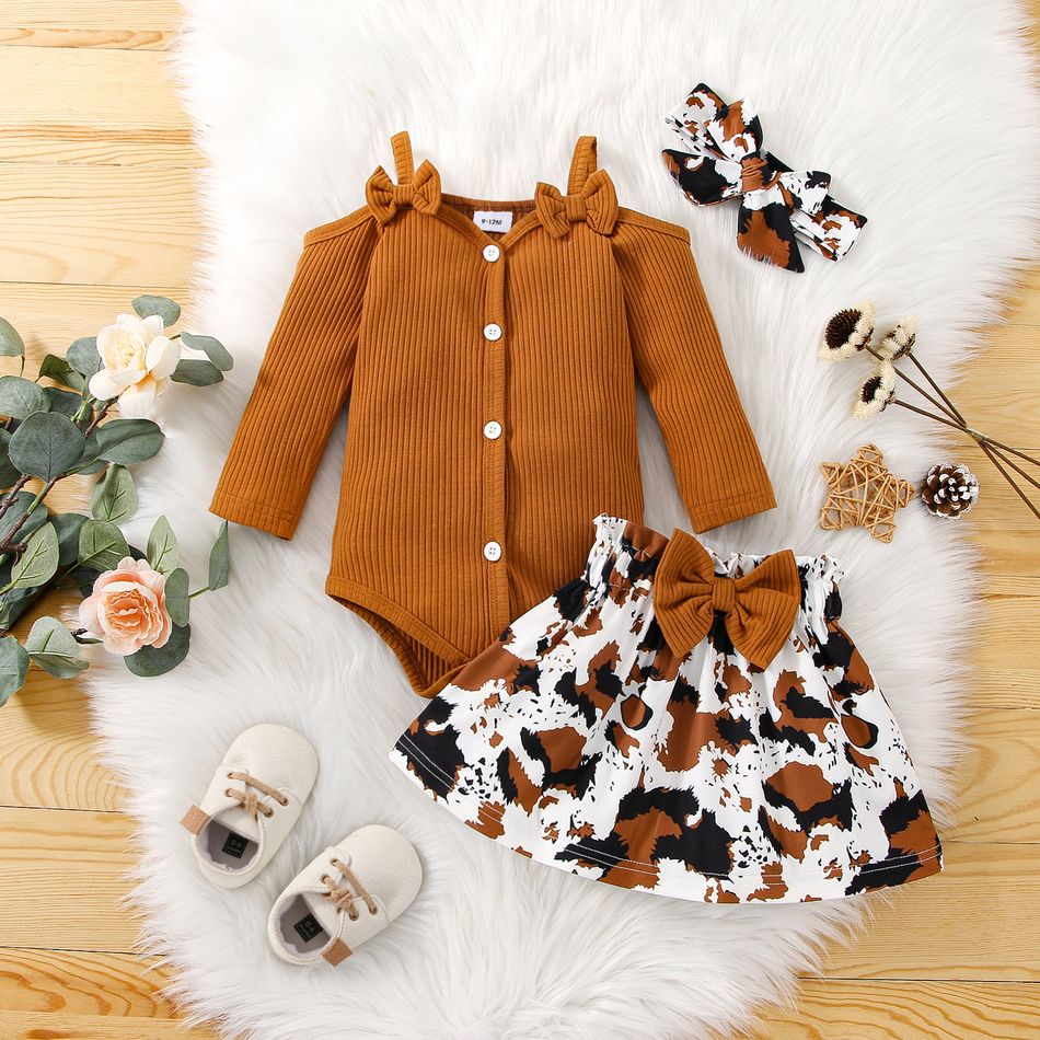 3pcs Baby Girl 95% Cotton Rib Knit Cold Shoulder Long-sleeve Bow Front Button Romper and Cow Print Skirt with Headband Set Brown