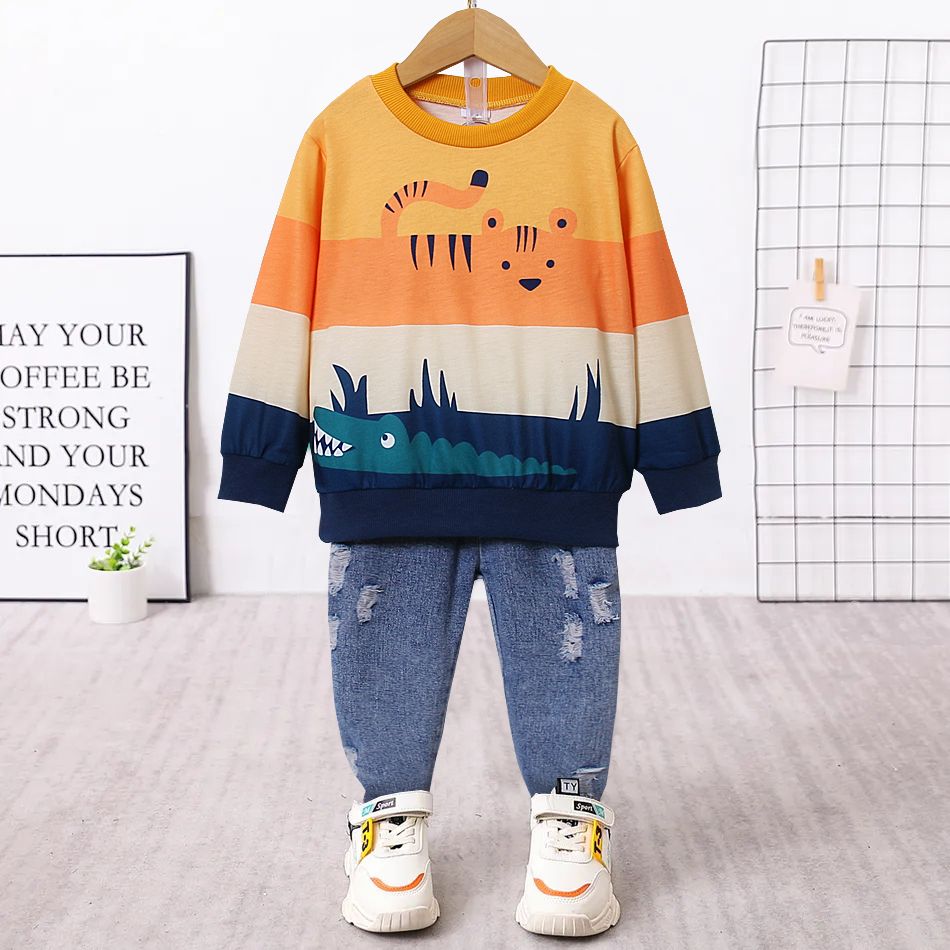 2pcs Toddler Boy Playful Ripped Denim Jeans and Animal Print Colorblock Sweatshirt Set Color block