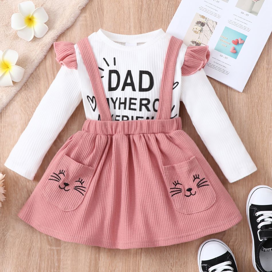 2-piece Toddler Girl Letter Print Ruffled Long-sleeve Ribbed Top and Cat Embroidered Waffle Suspender Skirt Set Pink