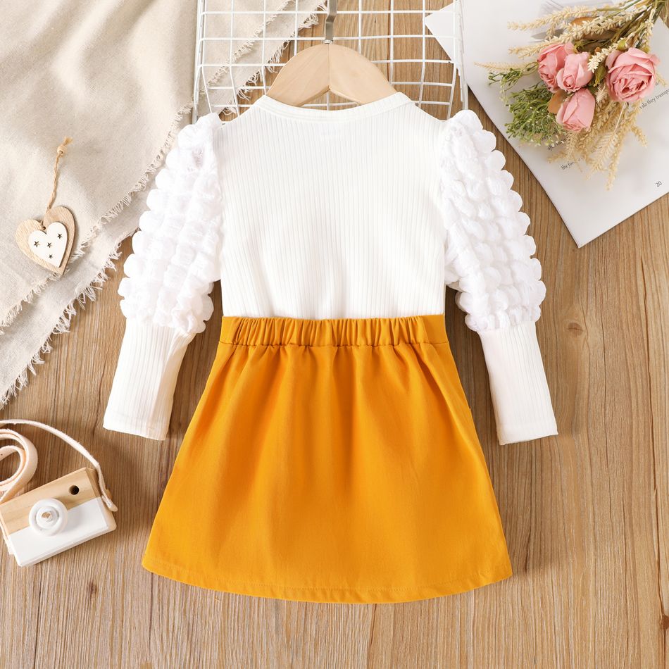 2pcs Toddler Girl Textured Puff-sleeve White Tee and Button Pocket Design Cotton Skirt Set Yellow big image 2