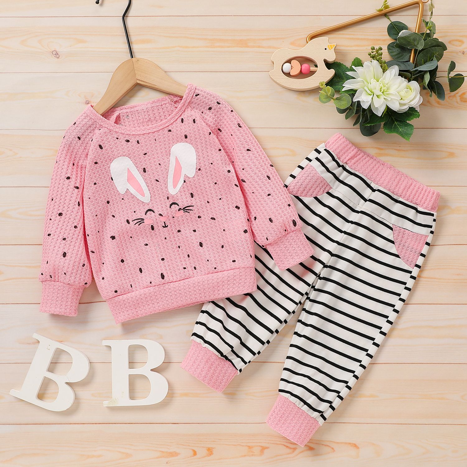 

2pcs Baby Girl 95% Cotton Striped Pants and Rabbit Graphic Long-sleeve Waffle Pullover Set