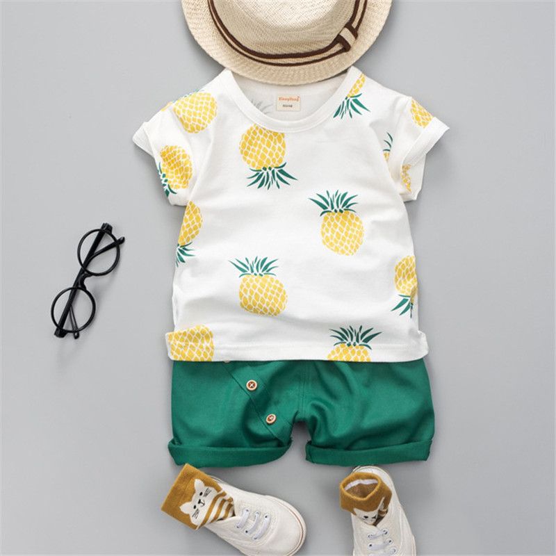2pcs Baby Boy 100% Cotton Solid Shorts and Allover Pineapple Print Short-sleeve Tee Set