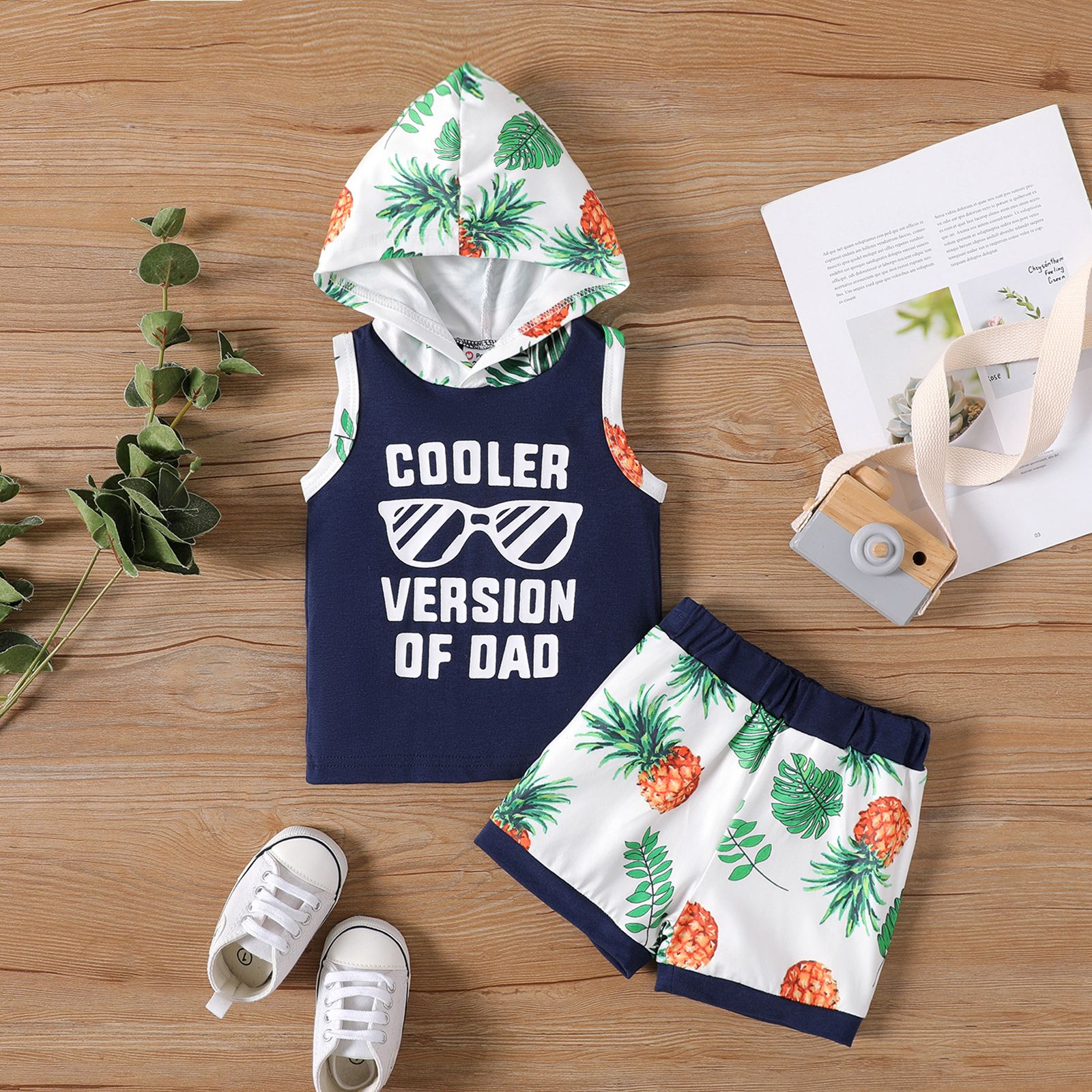 

2pcs Baby Boy Sunglass & Letter Graphic Hooded Tank Top and Allover Pineapple Print Shorts Set