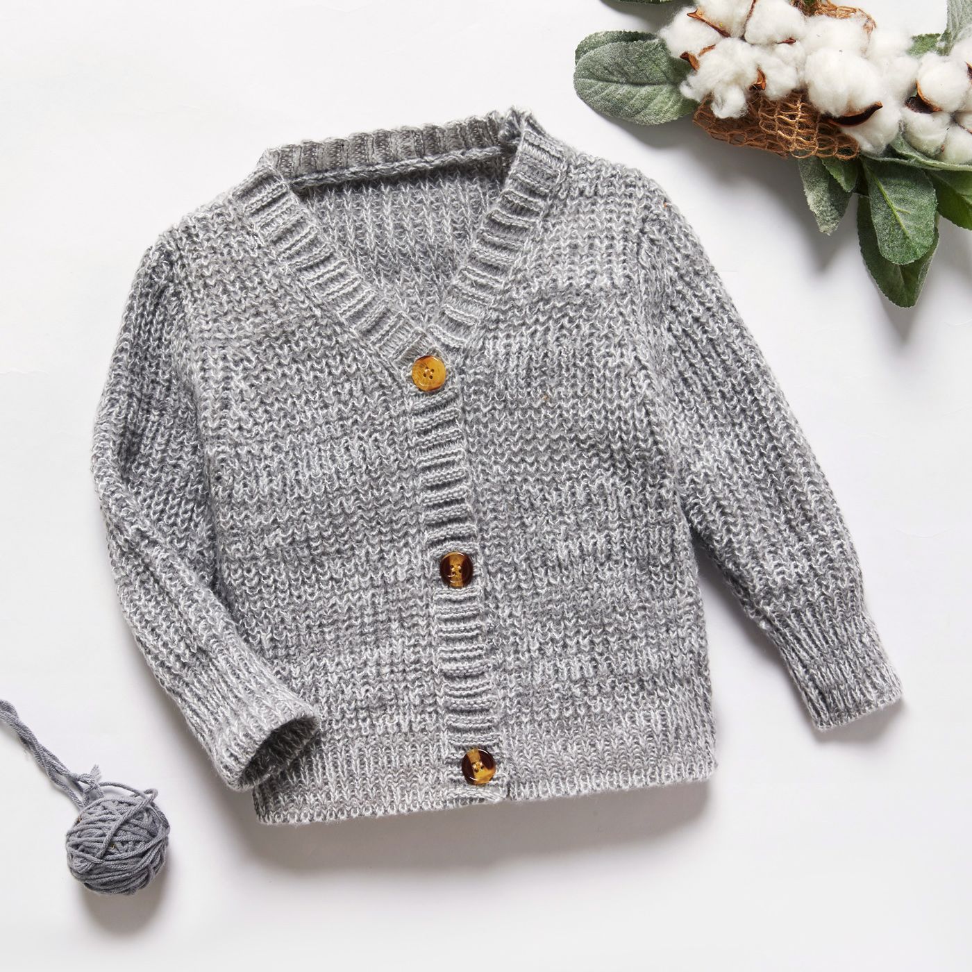 

Toddler Boy Solid Color Button and Floral Texture Design Sweater