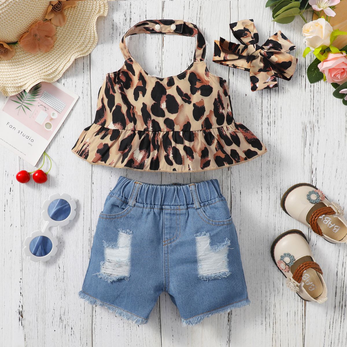 

3pcs Baby Girl 95% Cotton Ripped Denim Shorts and Leopard Print Halter Neck Ruffle Hem Top with Headband Set