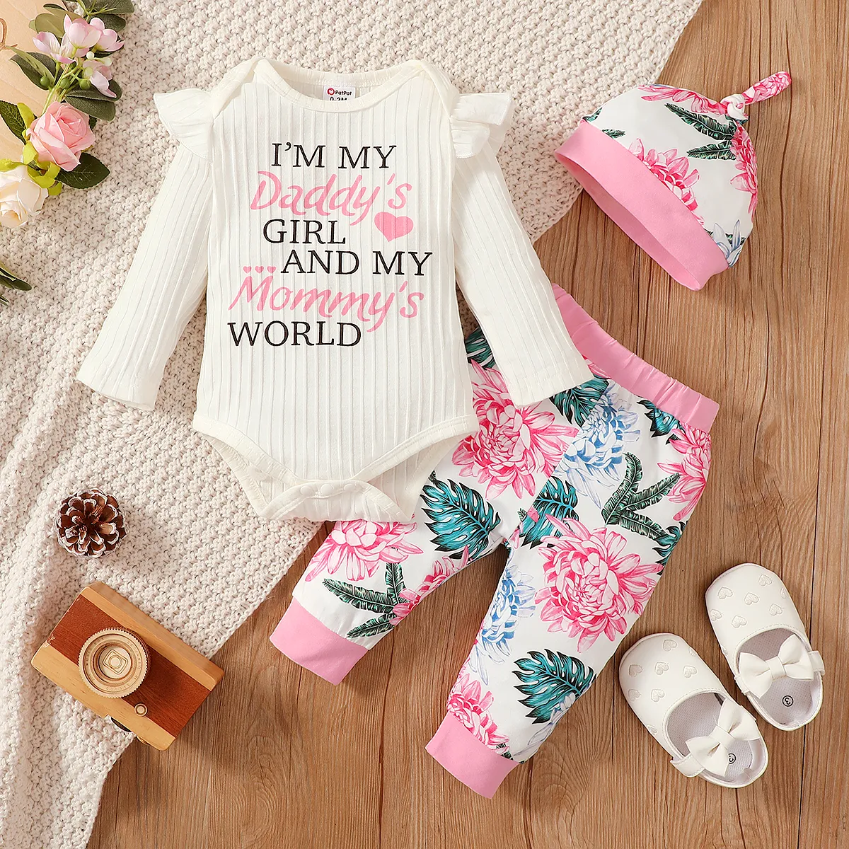 

3pcs Baby Girl 95% Cotton Long-sleeve Letter Print Rib Knit Romper and Allover Floral Print Pants with Hat Set