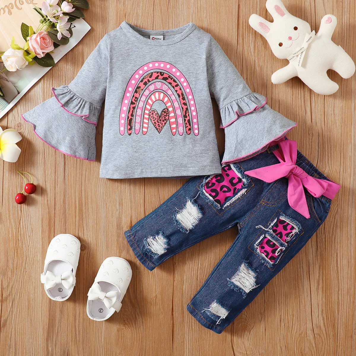 

2pcs Baby Girl 95% Cotton Bell-sleeve Rainbow Print Top and Belted Ripped Jeans Set