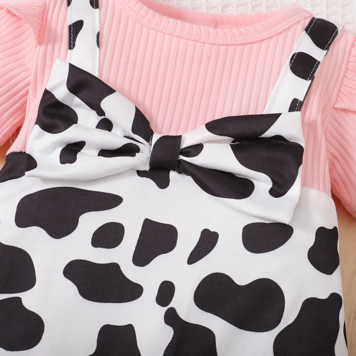 2pcs Baby Girl 95% Cotton Ribbed Ruffle Allover Cow Pattern Bow Decor Strappy Short-sleeve One-piece Jumpsuit & Headband Set Pink image 6