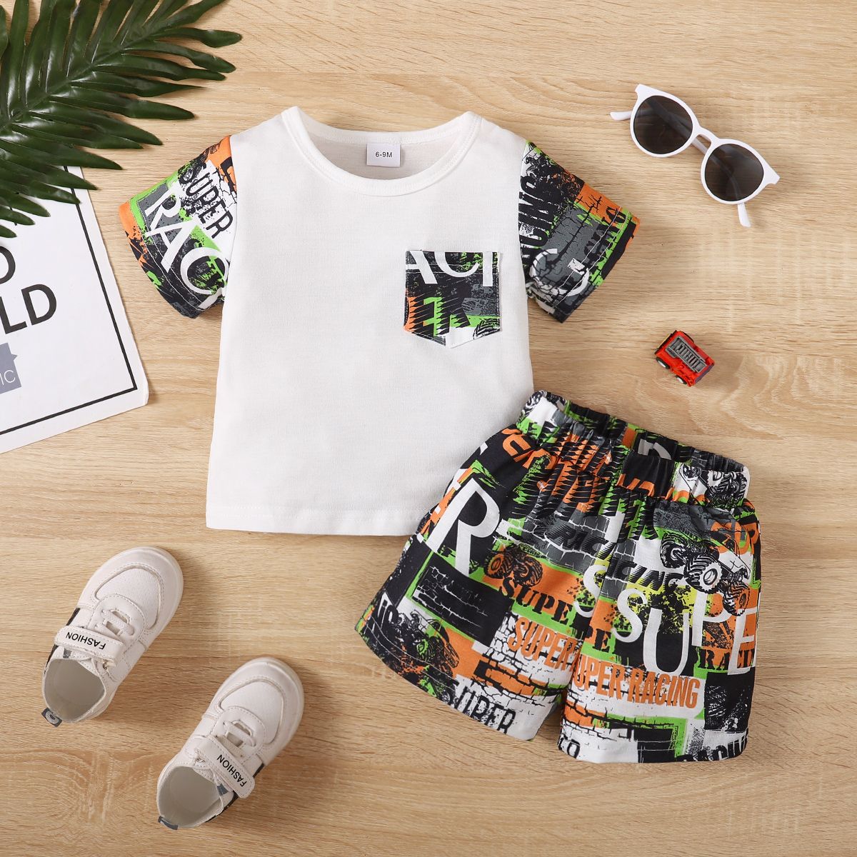

2pcs Baby Boy Letters Print Patch Pocket Short-sleeve Tee and Shorts Set