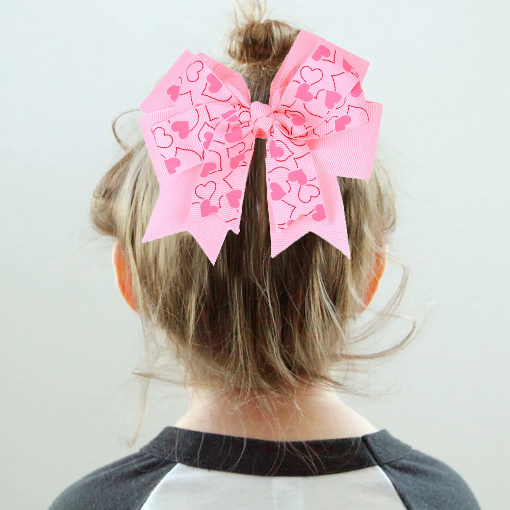 Paquete de 3 pinzas para el cabello con decoración de lazo con estampado de corazones para niñas (posición de impresión aleatoria) Multicolor big image 1
