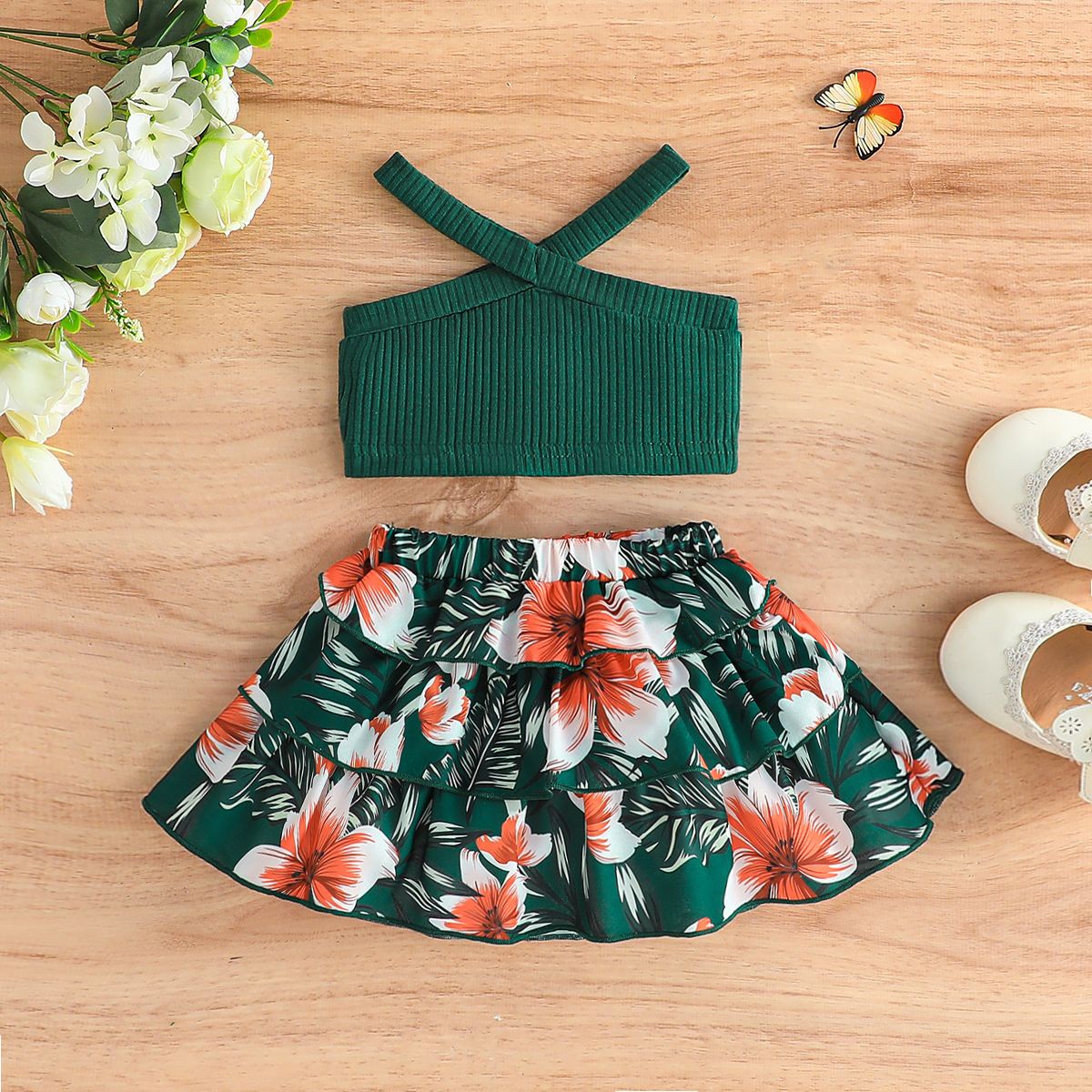 

2pcs Baby Girl Ribbed Crisscross Halter Top and Floral Print Skirt Set