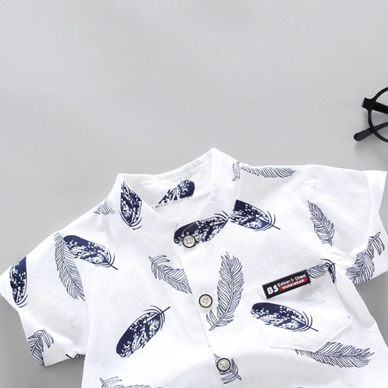 2pcs Baby Boy 95% Cotton Short-sleeve All Over Feather Print Button Up Shirt and Solid Shorts Set White big image 1