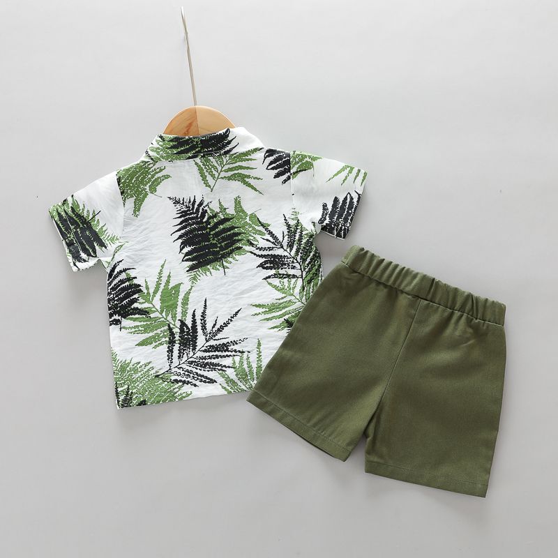 

2pcs Baby Boy 100% Cotton Solid Shorts and Allover Leaf Print Short-sleeve Shirt Set