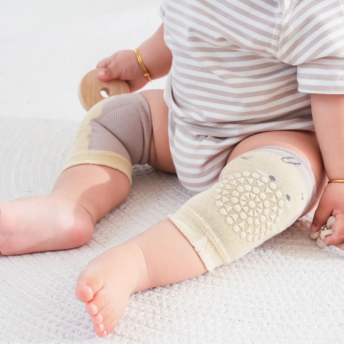 Joelheiras antiderrapantes respiráveis dos desenhos animados do bebê para meninos e meninas Gengibre
