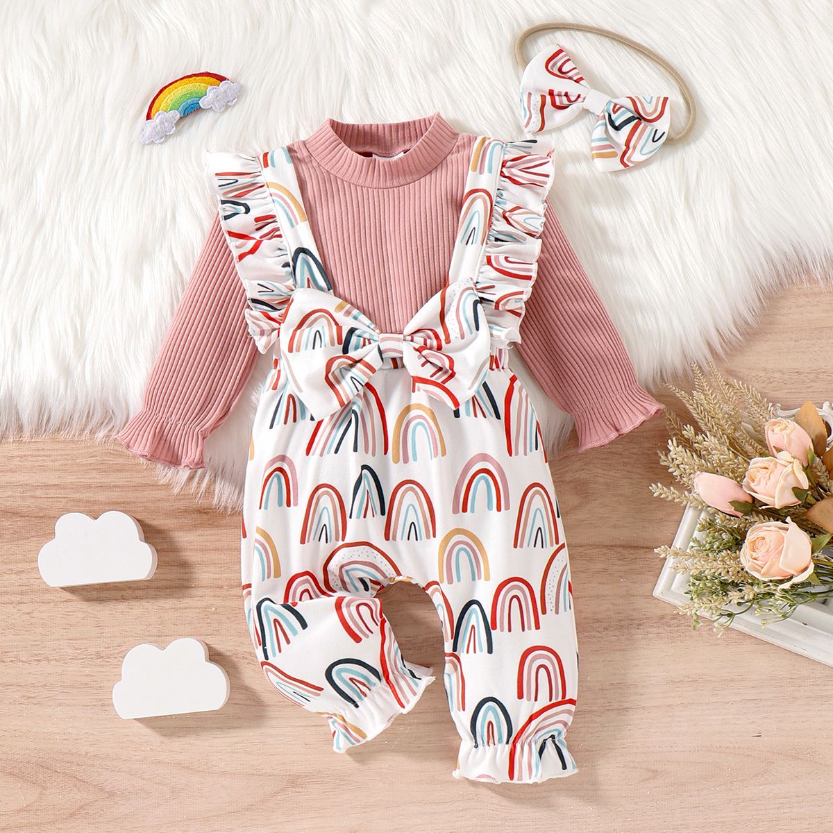 

3pcs Baby Girl Solid Cotton Ribbed Mock Neck Long-sleeve Romper and Allover Rainbow Print Ruffle Trim Bow Front Overalls & Headband Set