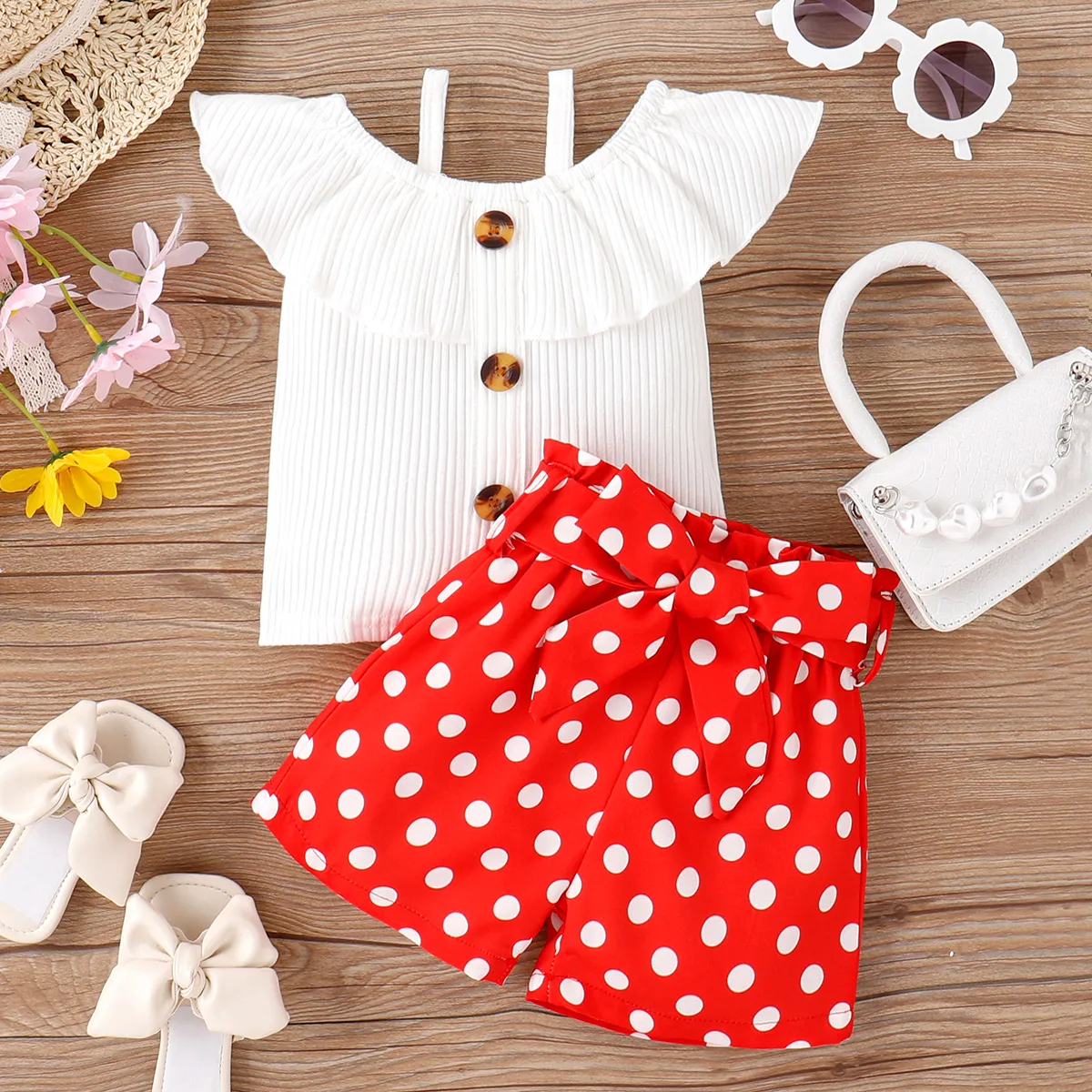 

2pcs Baby Girl 95% Cotton Ribbed Ruffle Collar Sleeveless Top and Polka Dots Print Belted Shorts Set