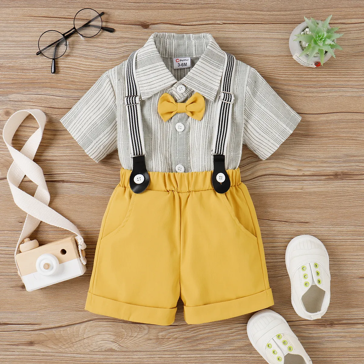 

2pcs Baby Boy Bow Tie Decor Striped Short-sleeve Shirt and Solid Suspender Shorts Set