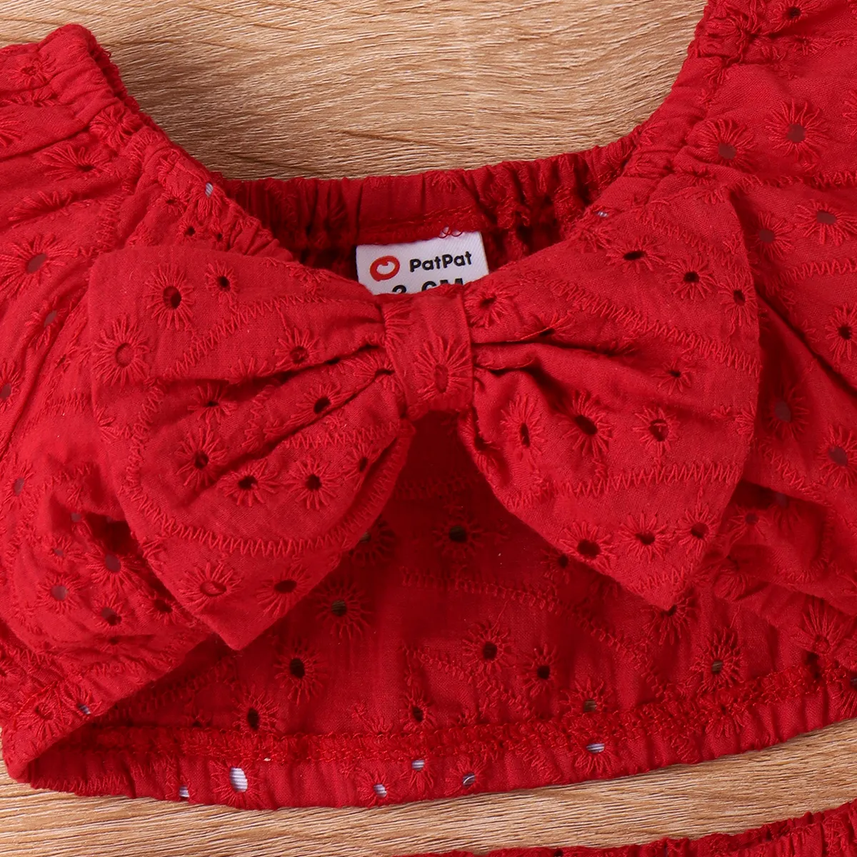 3pcs Baby Girl Solid Eyelet Embroidered Bow Front Short-sleeve Crop Top and High Low Hem Skirt & Headband Set Red big image 1
