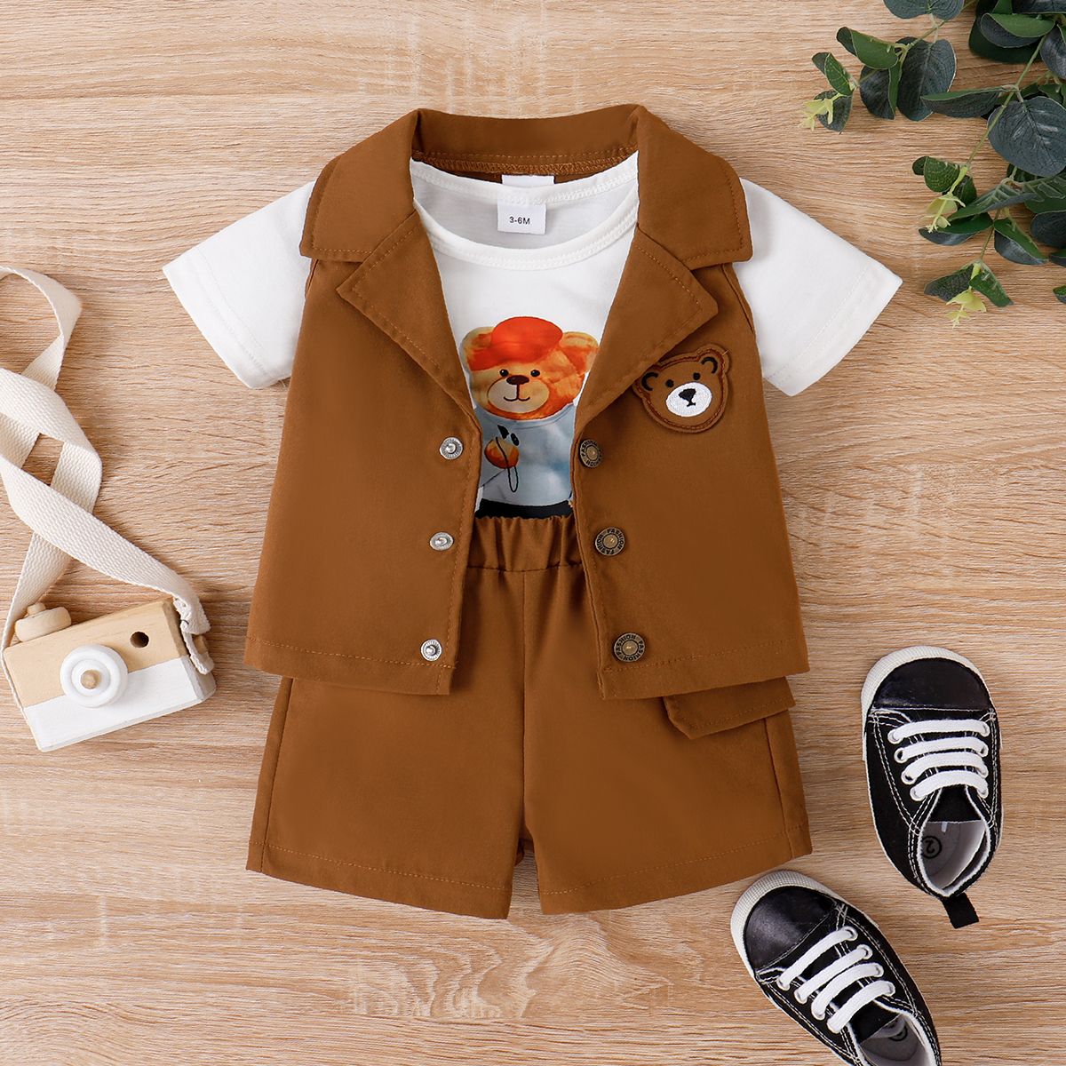 

3pcs Baby Boy Bear Pattern Short-sleeve Tee and Front Buttons Lapel Neck Blazer & Front Pocket Shorts Set