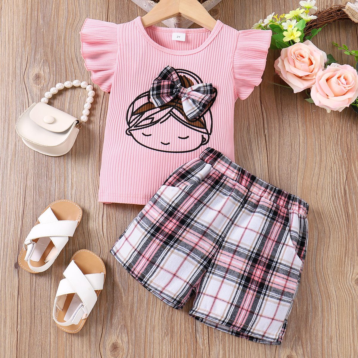 2pcs Toddler Girl 95% Cotton Bow Decor Girl Print Ribbed Ruffle Top and Pockets Plaid Shorts Set
