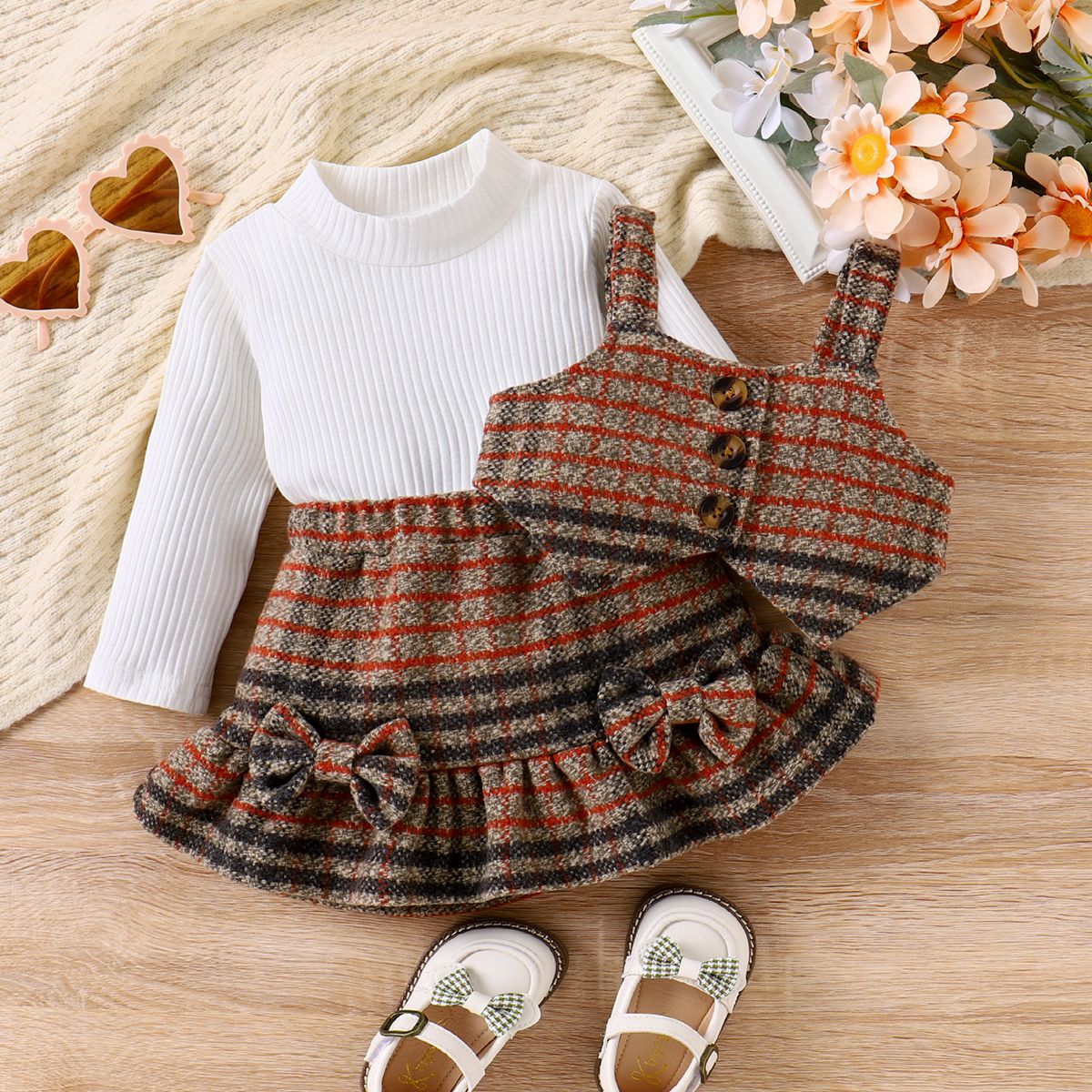 

3pcs Baby Girl 95% Cotton Ribbed Solid Long-sleeve Top and Plaid Ruffle Bow Decor Skirt & Buttons Front Strappy Vest Set