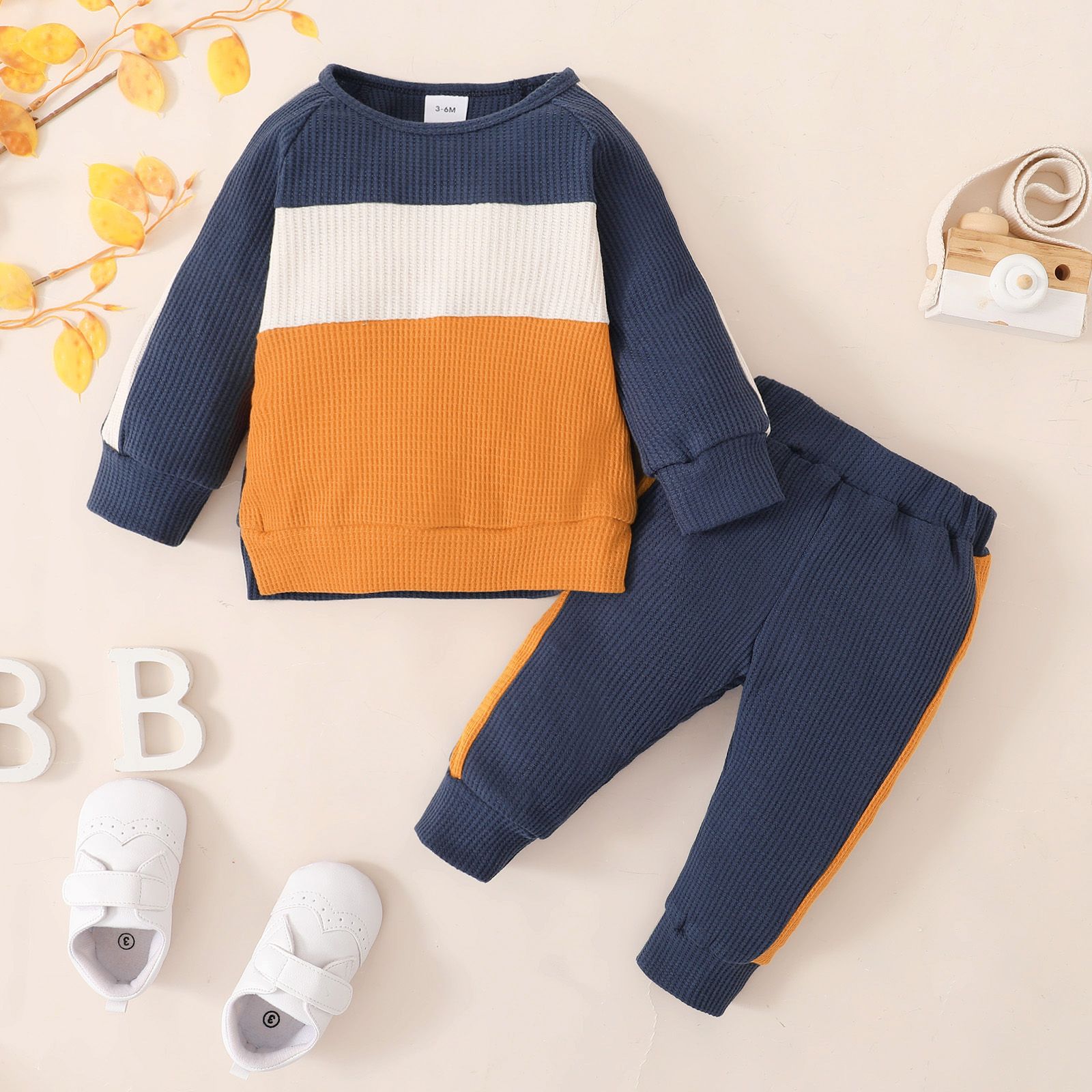 

2pcs Baby Boy/Girl Color Block Waffle Long-sleeve Sweatshirt and Track Pants Set