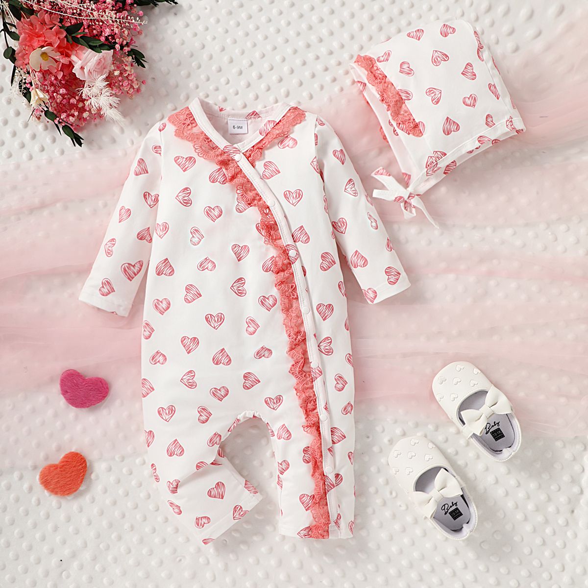 

2pcs Baby Girl Allover Heart Print Long-sleeve Jumpsuit and Hat Set