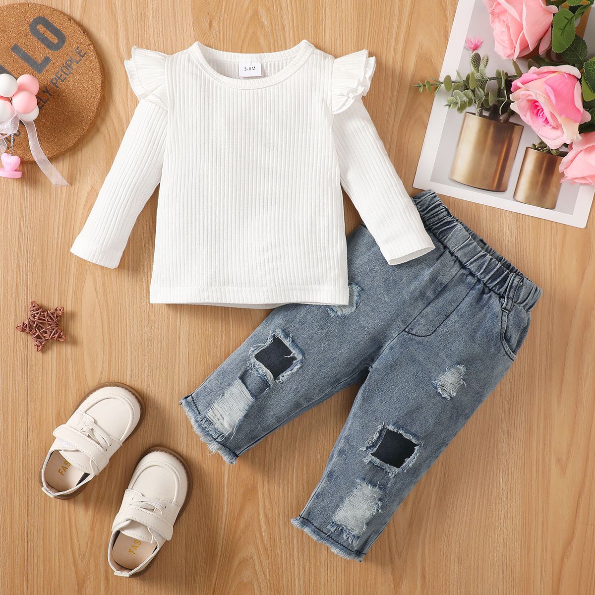 

2pcs Baby Girl 100% Cotton Ripped Jeans and Ribbed Ruffle Long-sleeve Tee Set