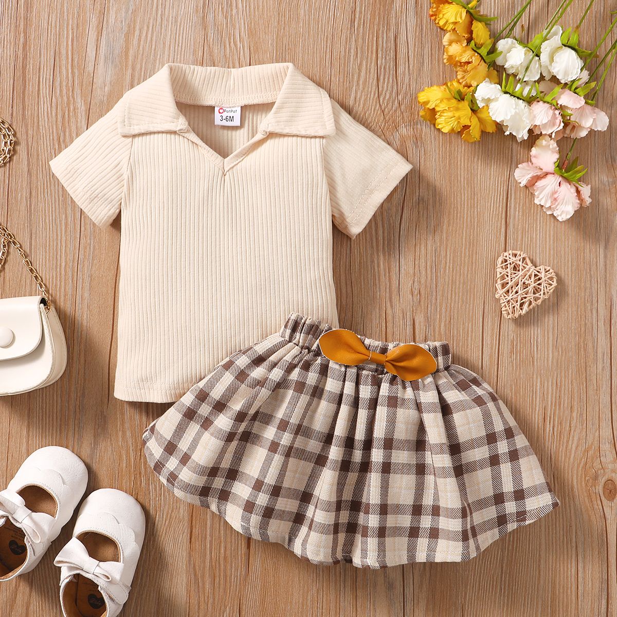 

2pcs Baby Girl Solid Ribbed V Neck Short-sleeve Top and Plaid Skirt Set