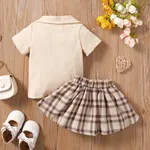 2pcs Baby Girl Solid Ribbed V Neck Short-sleeve Top and Plaid Skirt Set  image 2