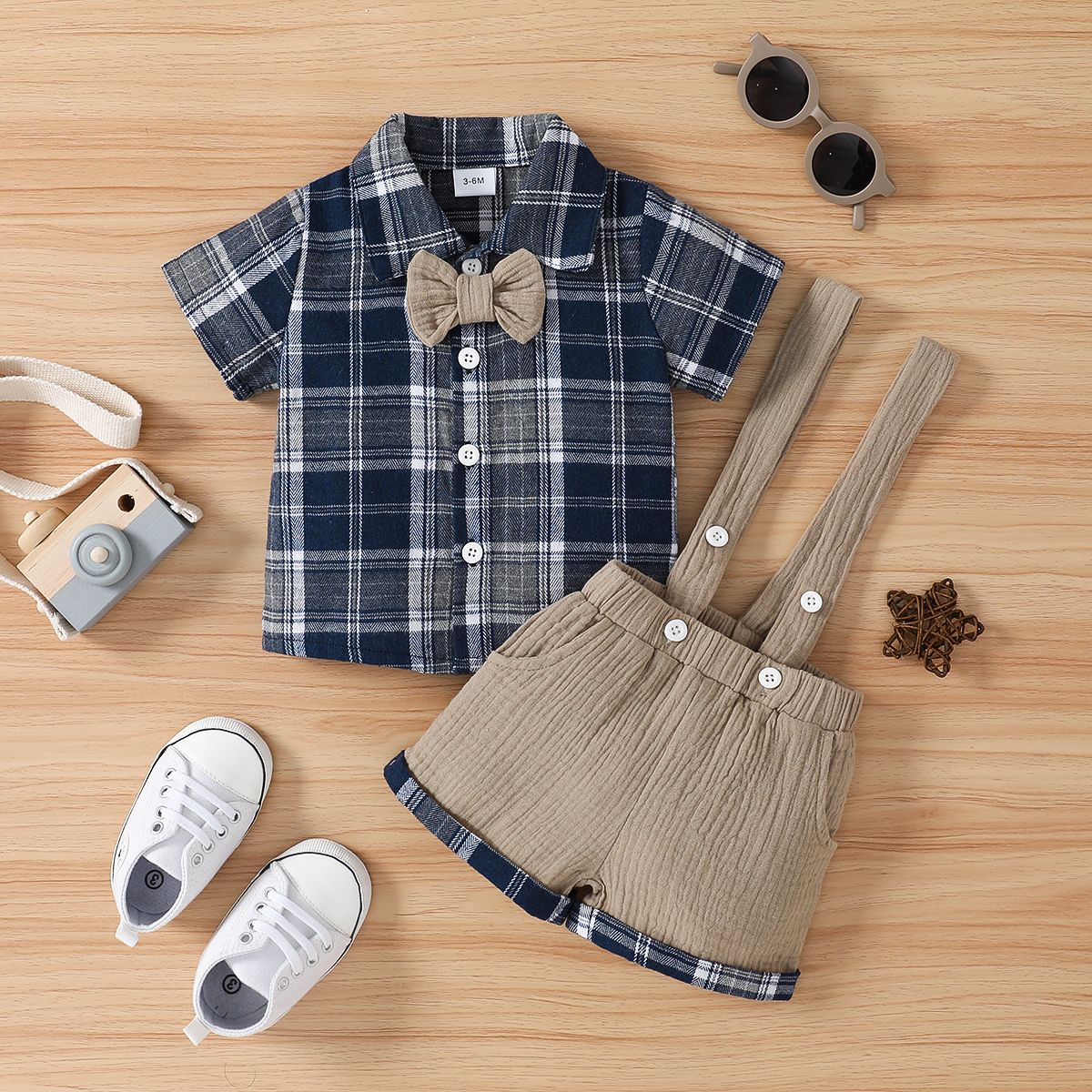 

2pcs Baby Boy 100% Cotton Crepe Suspender Shorts and Bow Tie Decor Short-sleeve Plaid Shirt Set