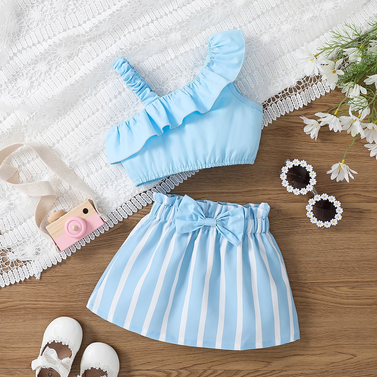 

2pcs Toddler Girl 100% Cotton Trendy One-Shoulder Ruffled Top and Bow Front Stripe Skirt Set