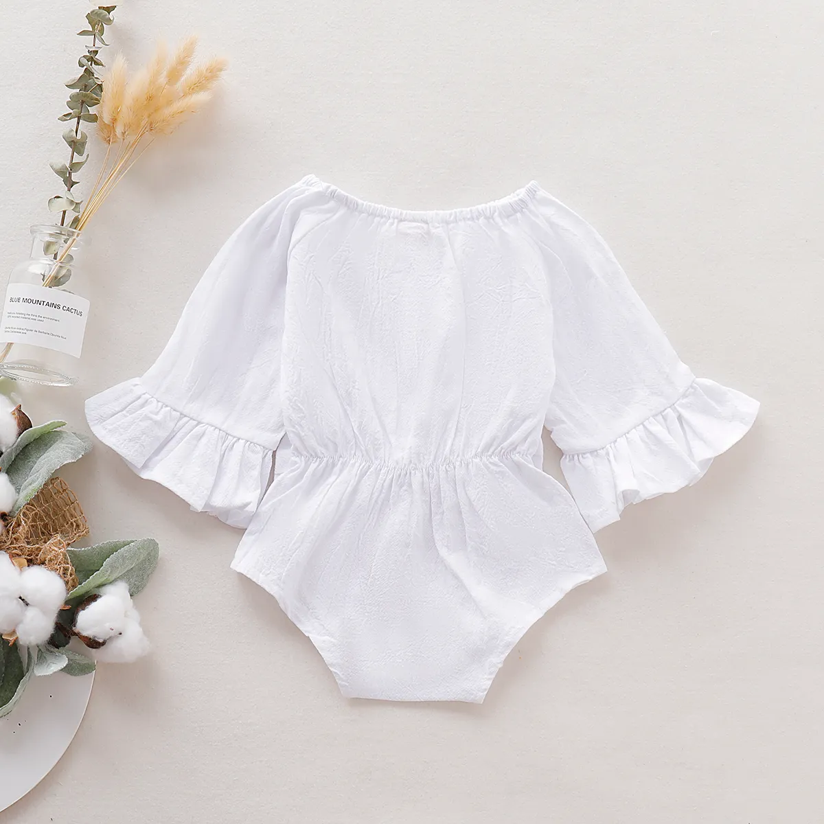 100% Cotton Solid Bowknot Decor Long-sleeve Baby Romper White big image 1