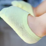 calcetines antideslizantes sólidos para bebés Amarillo