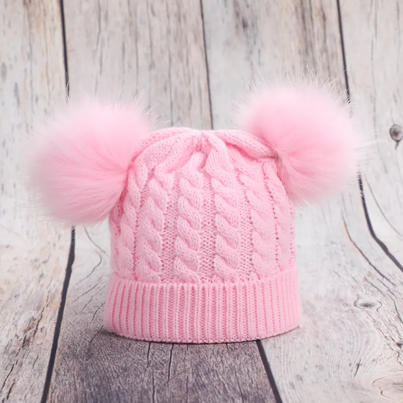 Baby-/Kleinkind-Mütze mit festem Bommel, gestrickt rosa big image 1
