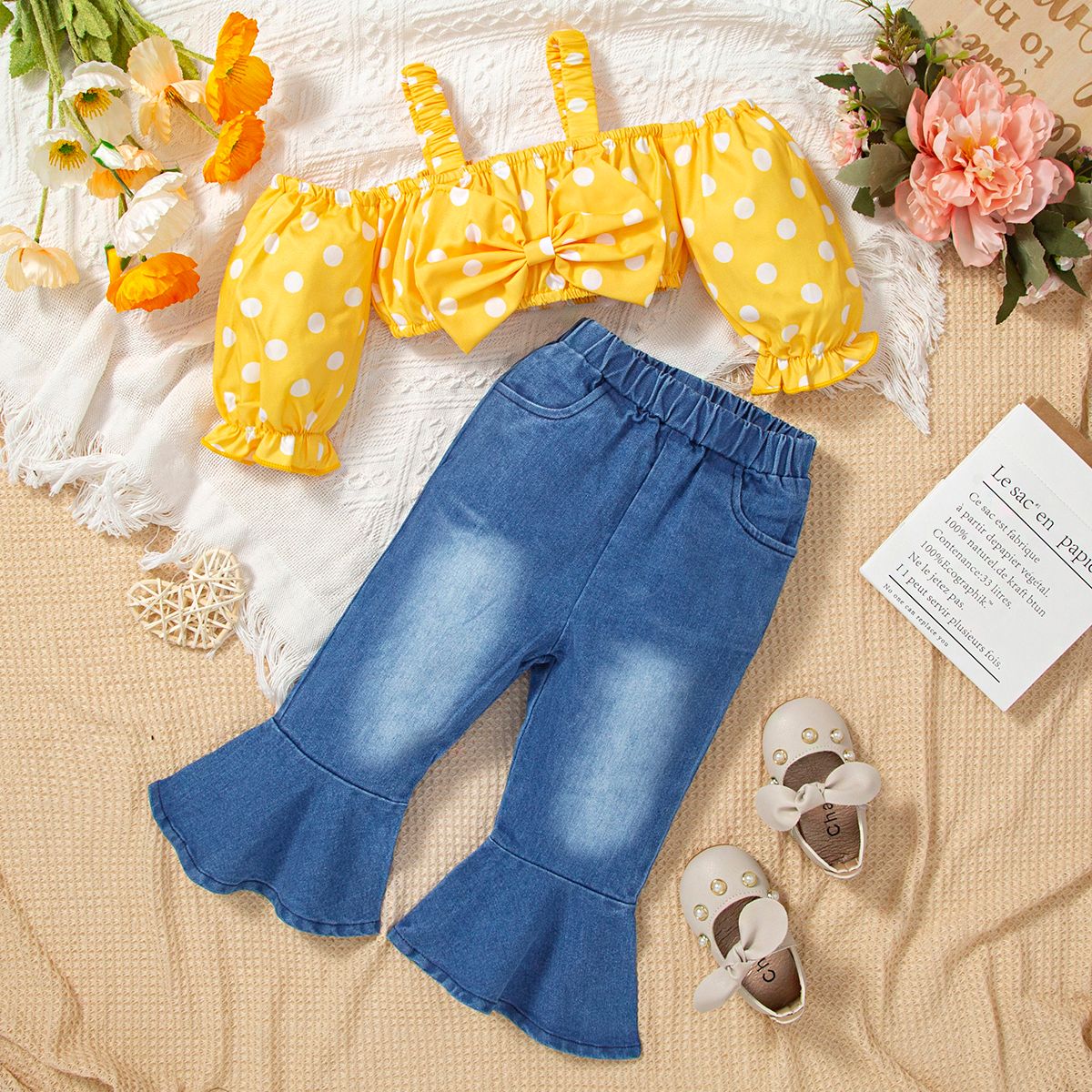 

2pcs Baby Girl 100% Cotton Flared Jeans and Polka Dot Print Cold Shoulder Long-sleeve Bow Front Crop Top Set