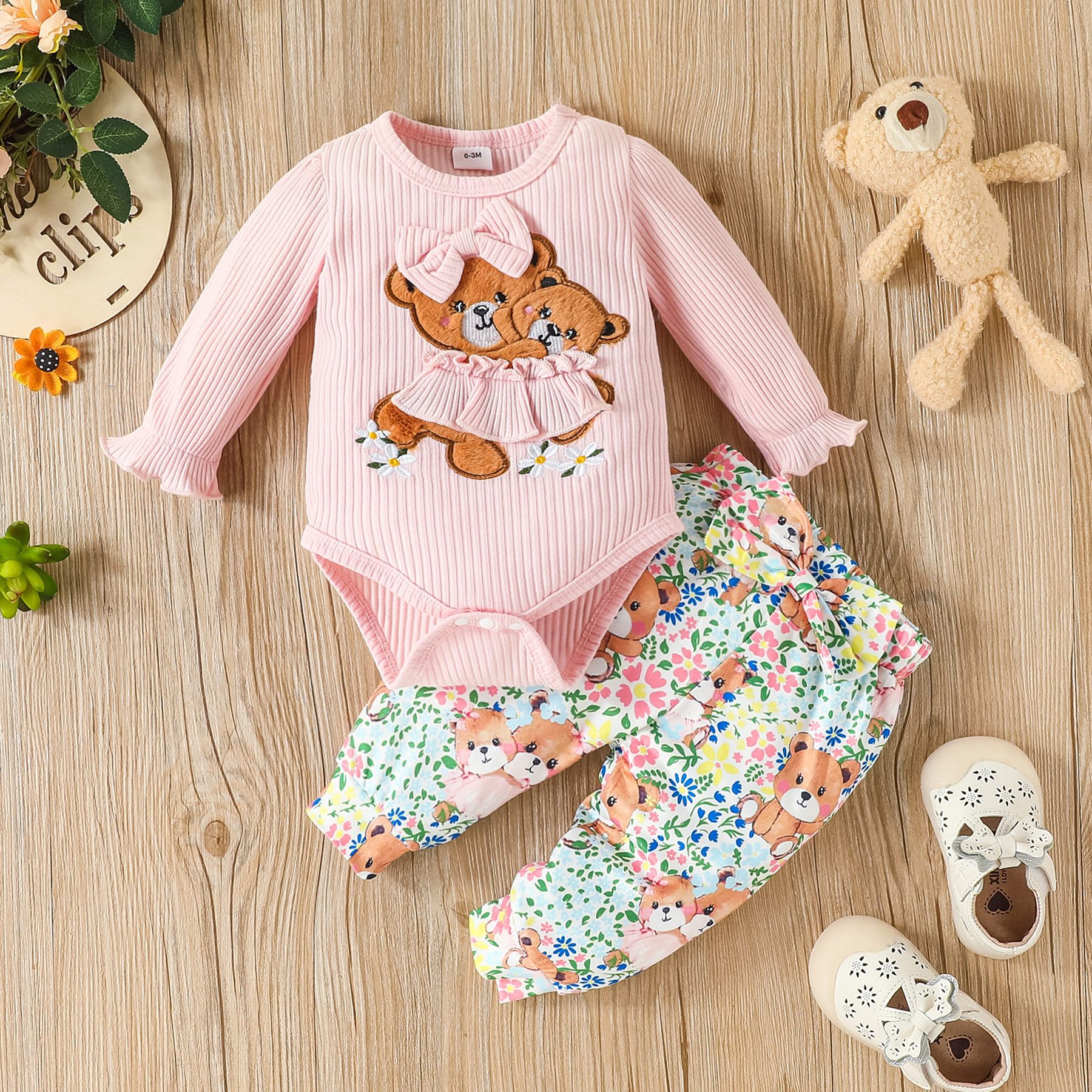 

2pcs Baby Girl 95% Cotton Ribbed Long-sleeve Bear Embroidered Romper and Floral Print Bow Front Pants Set