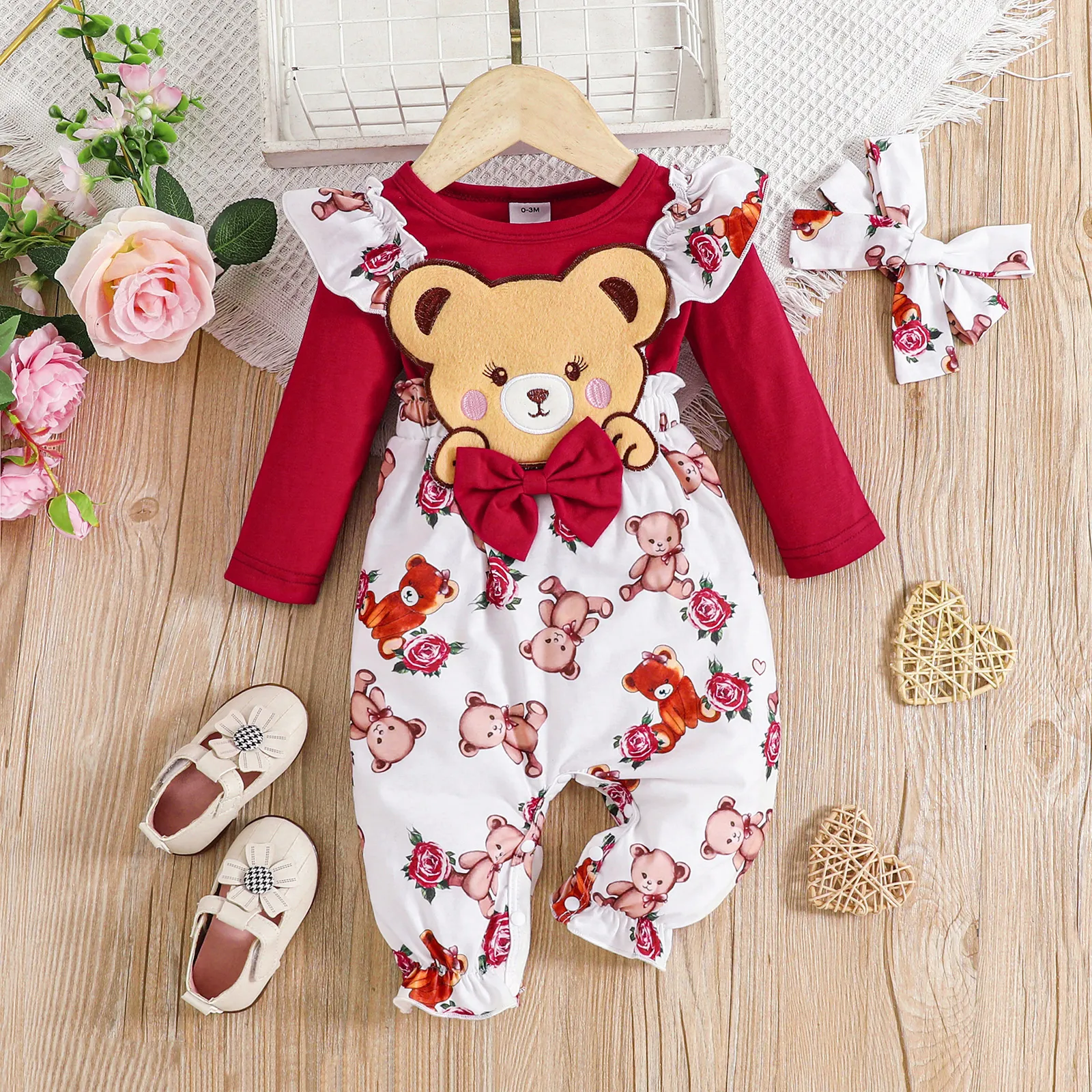 

2pcs Baby Girl 95% Cotton Long-sleeve Bear Graphic Bow Front Spliced Allover Print Jumpsuit with Headband Set