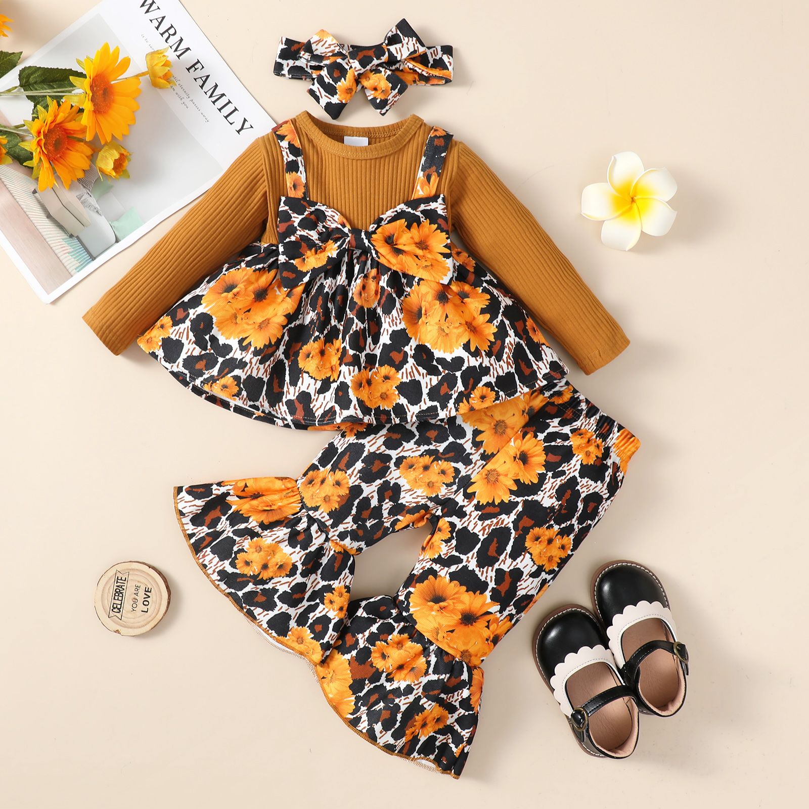 

3pcs Baby Girl Solid Rib Knit Spliced Allover Sunflower & Leopard Print Bow Front Long-sleeve Top and Flared Pants with Headband Set