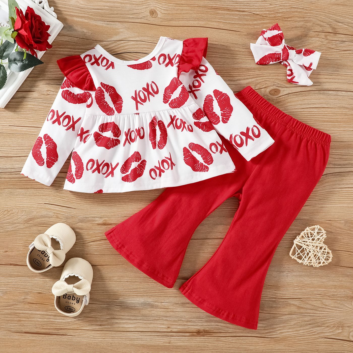 

3pcs Baby Girl 95% Cotton Flared Pants and Allover Red Lips & Letter Print Ruffle Trim Long-sleeve Top with Headband Set