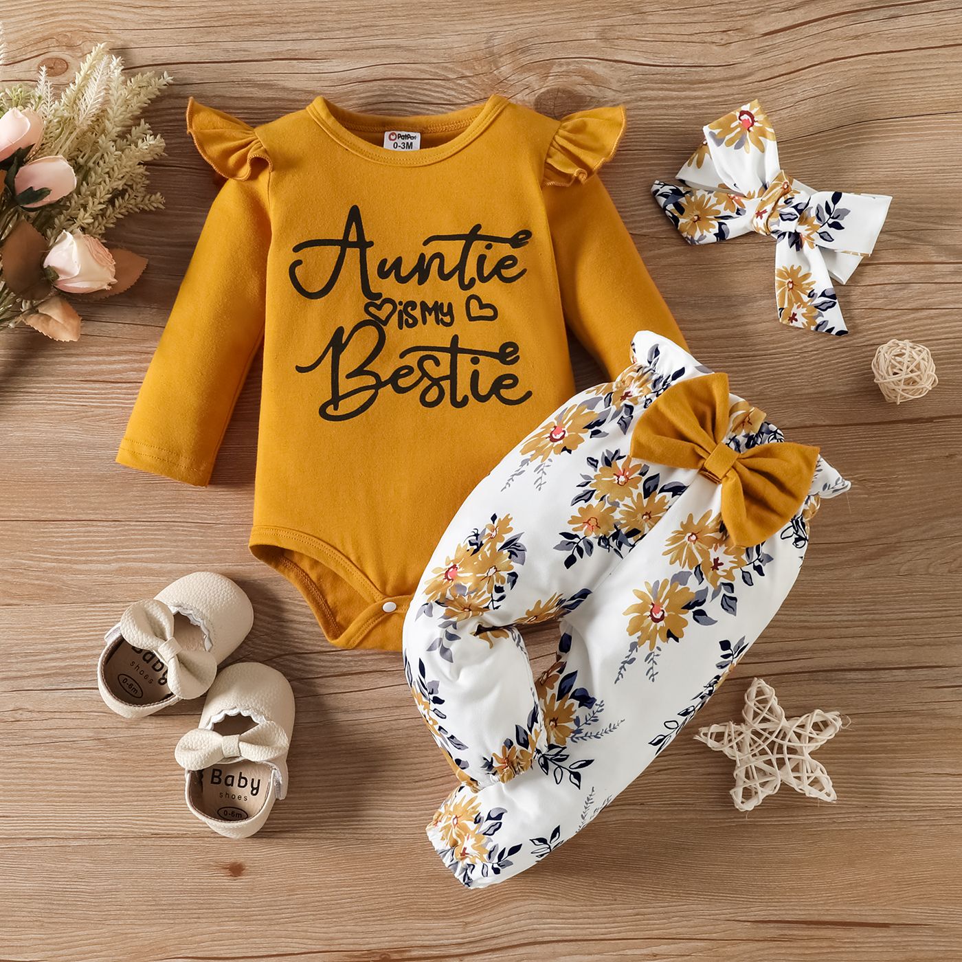 

3pcs Baby Girl 95% Cotton Ruffle Long-sleeve Letter Graphic Romper and Bow Front Floral Print Pants with Headband Set