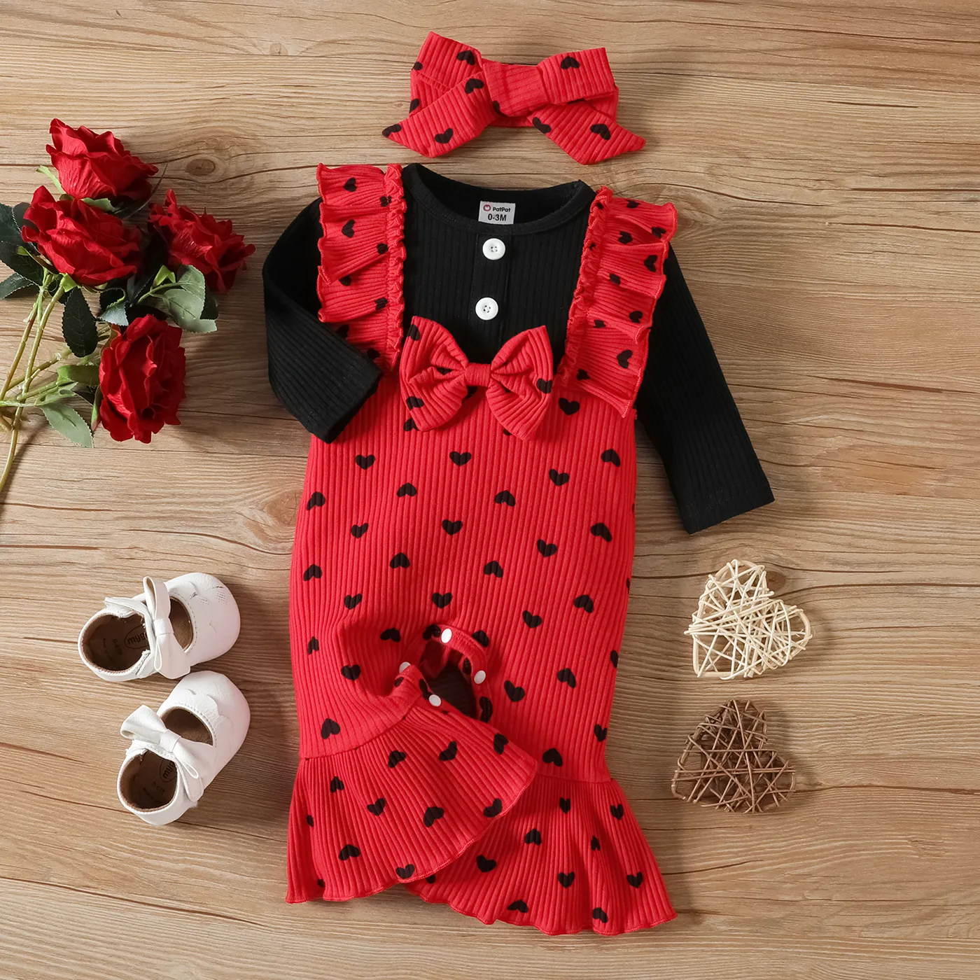 

2pcs Baby Girl 95% Cotton Allover Heart Print Ribbed Ruffle Trim Spliced Long-sleeve Bell Bottom Jumpsuit with Headband Set