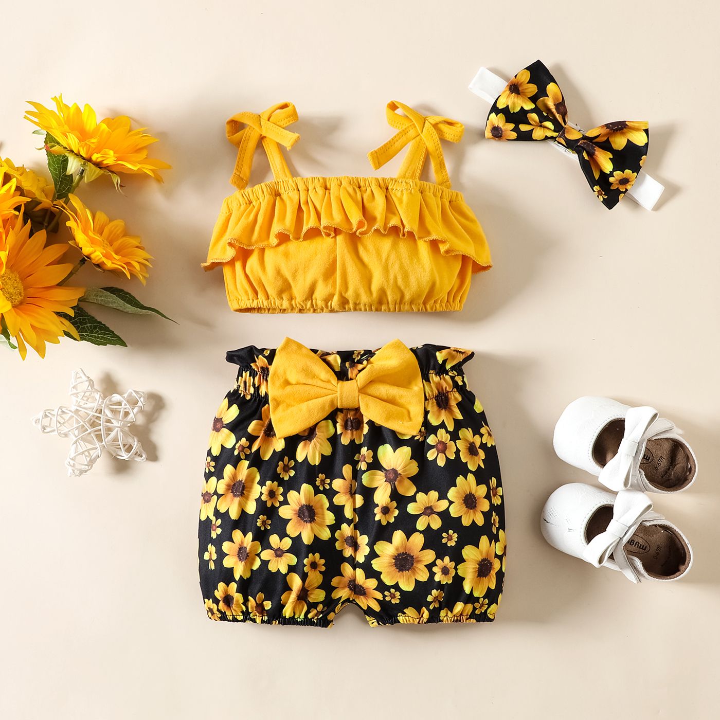 

3pcs Baby Girl 95% Cotton Solid Ruffled Crop Cami Top and Allover Floral Print Shorts & Headband Set